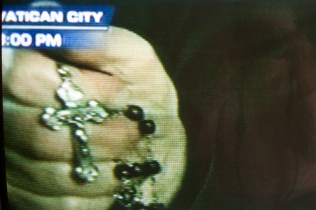 Rosary held by nun